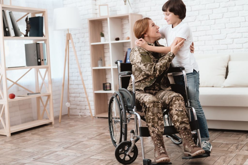 Military mom in wheelchair with kid