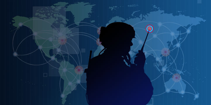 A soldier with a radio in front of a world map.