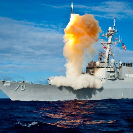 Warship launching missile.